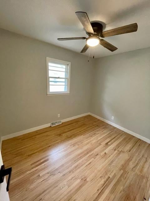 4155 7th St, Goodview, MN 55987 - empty room featuring light wood-type flooring, baseboards, and a ceiling fan