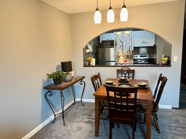 1181 Edgcumbe Rd Unit 213, Saint Paul, MN 55105 - carpeted dining space with arched walkways and baseboards