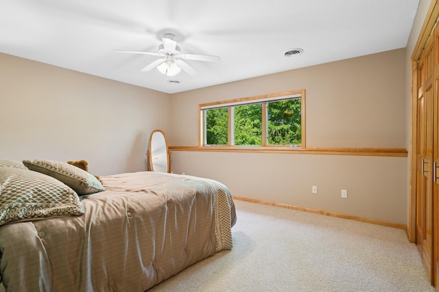 6654 Orchid Ln N, Maple Grove, MN 55311 - bedroom featuring light carpet, baseboards, and a ceiling fan
