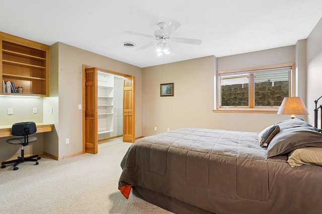 6654 Orchid Ln N, Maple Grove, MN 55311 - bedroom with light carpet, baseboards, and ceiling fan