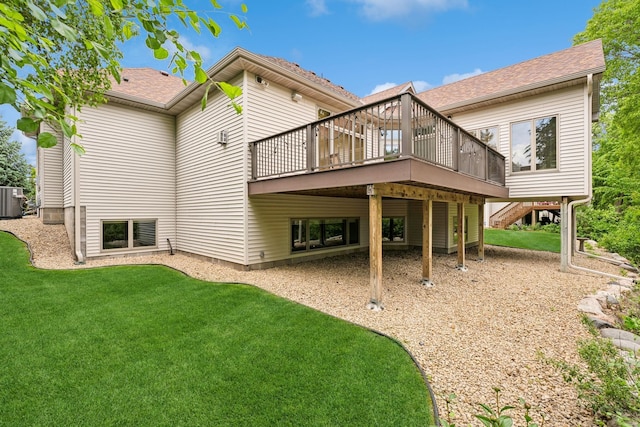 6654 Orchid Ln N, Maple Grove, MN 55311 - rear view of house featuring a deck, a yard, central AC, and roof with shingles