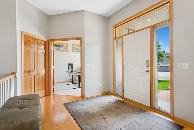 6654 Orchid Ln N, Maple Grove, MN 55311 - foyer entrance with light wood-type flooring and baseboards