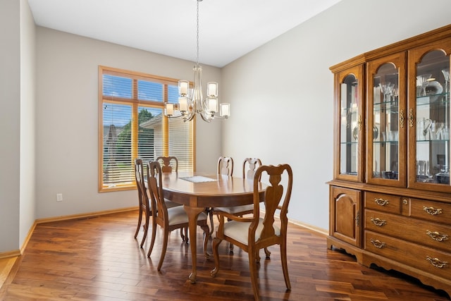 6654 Orchid Ln N, Maple Grove, MN 55311 - dining area featuring a chandelier, baseboards, and dark wood finished floors