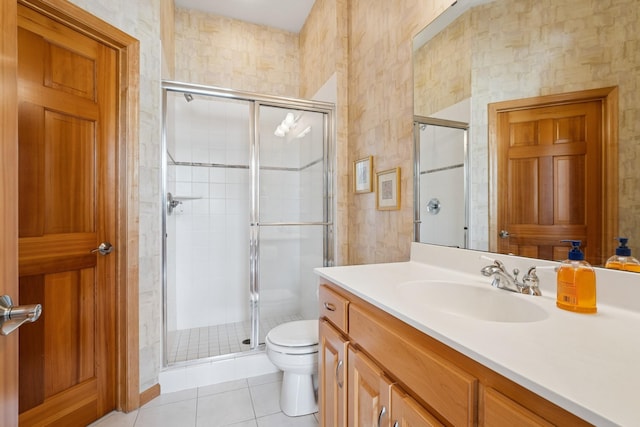 6654 Orchid Ln N, Maple Grove, MN 55311 - full bath with toilet, vanity, a stall shower, and tile patterned flooring