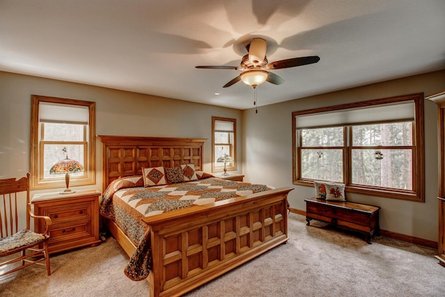 20929 Faron Dr, Nevis, MN 56467 - bedroom with light carpet, ceiling fan, and baseboards