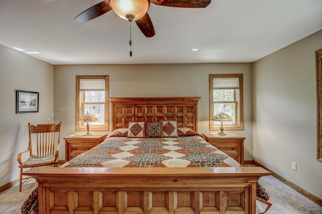20929 Faron Dr, Nevis, MN 56467 - bedroom with baseboards, multiple windows, light carpet, and ceiling fan
