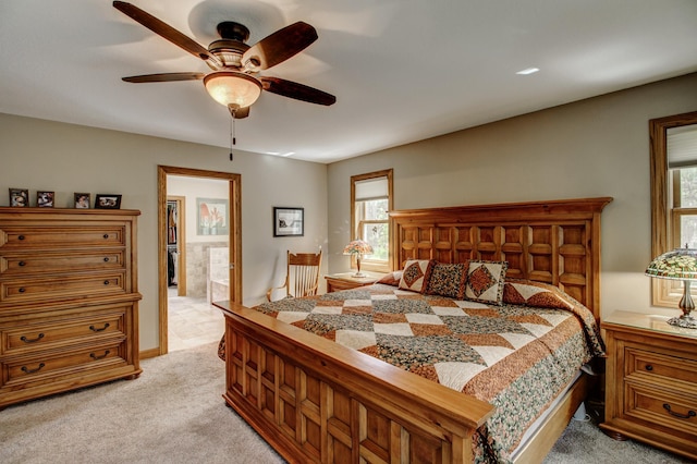 20929 Faron Dr, Nevis, MN 56467 - bedroom featuring light carpet, ensuite bath, and a ceiling fan