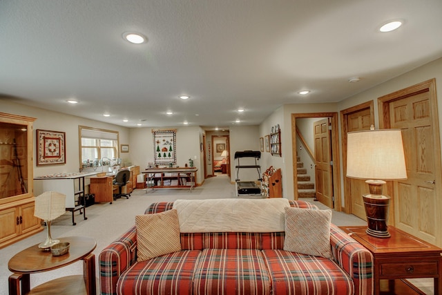 20929 Faron Dr, Nevis, MN 56467 - carpeted living area featuring stairway and recessed lighting