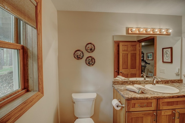 20929 Faron Dr, Nevis, MN 56467 - half bath featuring vanity and toilet