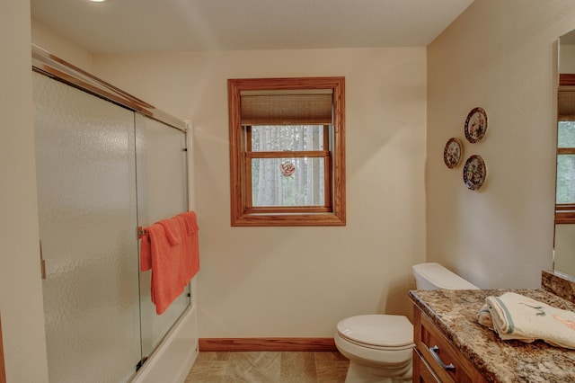 20929 Faron Dr, Nevis, MN 56467 - bathroom featuring toilet, vanity, and baseboards
