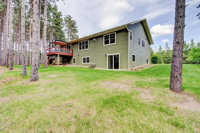 20929 Faron Dr, Nevis, MN 56467 - back of property featuring a deck and a yard