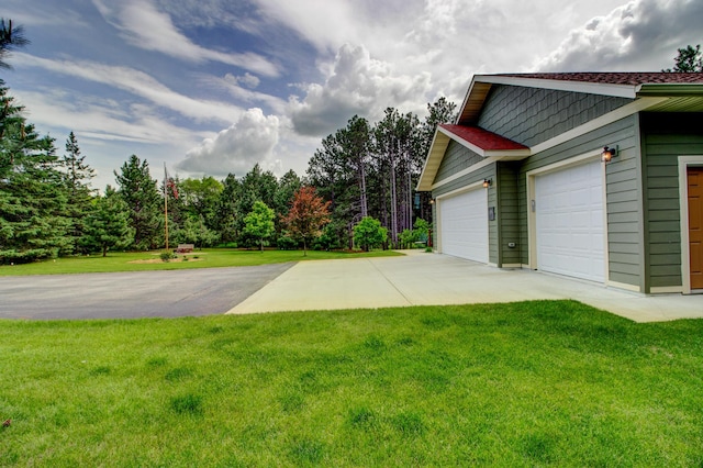 20929 Faron Dr, Nevis, MN 56467 - view of grassy yard featuring asphalt driveway