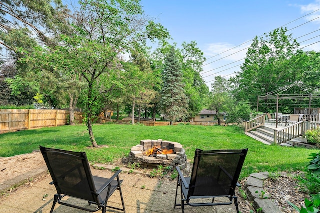 11411 Johnson Cir, Bloomington, MN 55437 - view of yard featuring an outdoor fire pit, a gazebo, and a deck