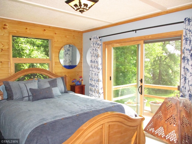 43639 351st Ln, Aitkin Twp, MN 56431 - bedroom with wooden walls