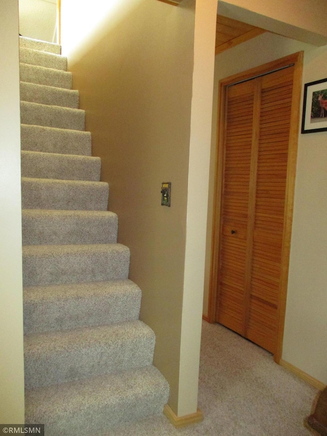 43639 351st Ln, Aitkin Twp, MN 56431 - staircase featuring carpet and baseboards