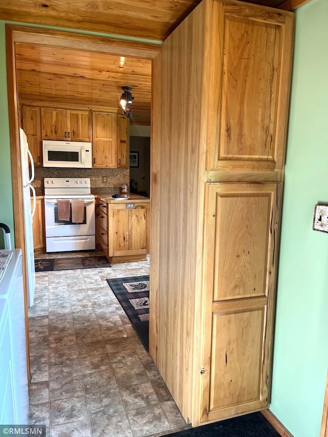 43639 351st Ln, Aitkin Twp, MN 56431 - kitchen with white appliances, wood ceiling, and backsplash