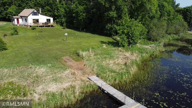 43639 351st Ln, Aitkin Twp, MN 56431 - view of green lawn with a view of trees and a deck with water view