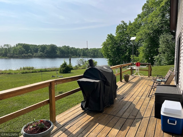 43639 351st Ln, Aitkin Twp, MN 56431 - wooden deck featuring a water view, a yard, and area for grilling