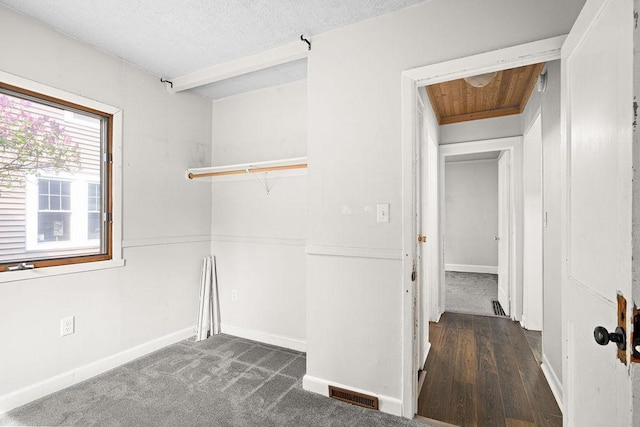 627 Skyline Pkwy, Duluth, MN 55805 - unfurnished room with baseboards, wood finished floors, and a textured ceiling