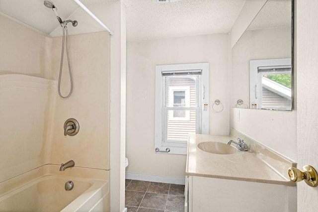 627 Skyline Pkwy, Duluth, MN 55805 - bathroom with toilet, vanity,  shower combination, baseboards, and a textured ceiling