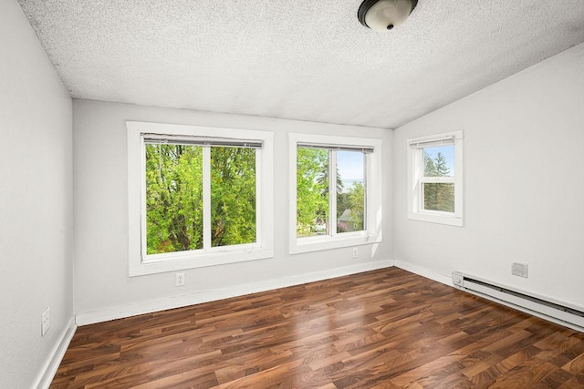 627 Skyline Pkwy, Duluth, MN 55805 - empty room with a textured ceiling, healthy amount of natural light, a baseboard radiator, vaulted ceiling, and wood finished floors