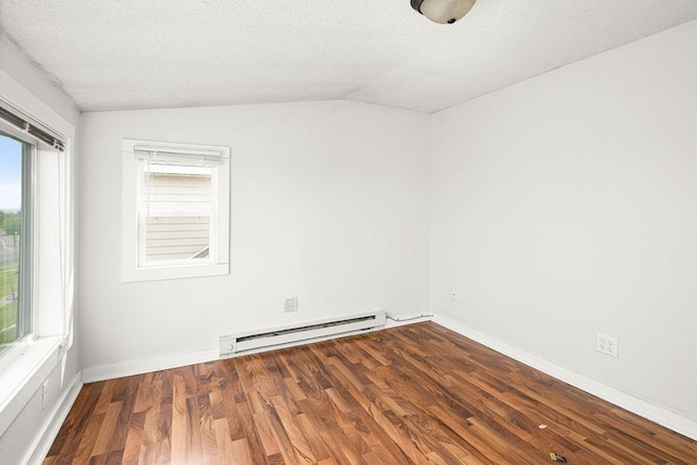 627 Skyline Pkwy, Duluth, MN 55805 - empty room with a baseboard heating unit, lofted ceiling, a textured ceiling, plenty of natural light, and wood finished floors