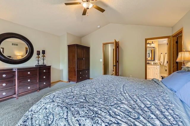 9025 Mcguffey Rd, Eden Prairie, MN 55347 - carpeted bedroom with vaulted ceiling, ensuite bathroom, and a ceiling fan