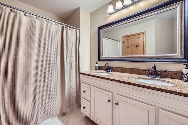 9025 Mcguffey Rd, Eden Prairie, MN 55347 - bathroom with double vanity, tile patterned flooring, and a shower with curtain