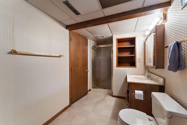 2142 Cottage Ave E, Saint Paul, MN 55119 - full bath with toilet, vanity, a shower stall, baseboards, and tile patterned floors