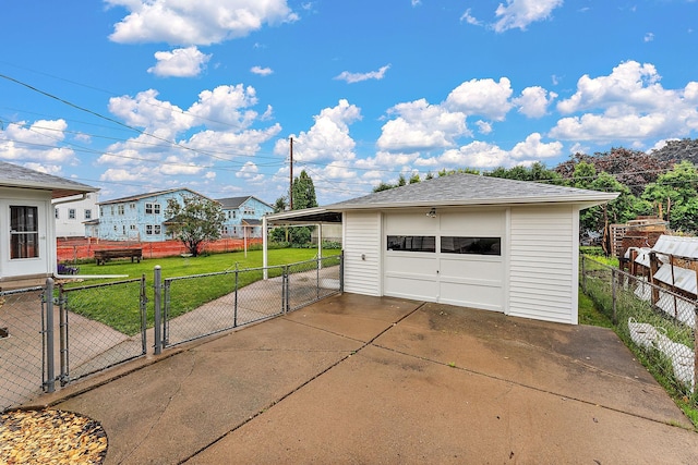 2142 Cottage Ave E, Saint Paul, MN 55119 - detached garage with a gate and concrete driveway