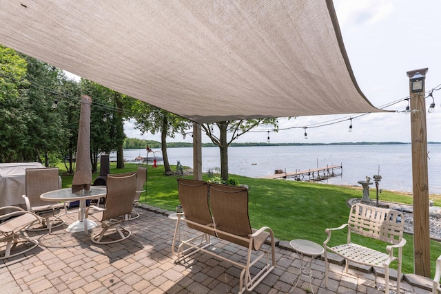 17159 Stalker Lake Rd, Battle Lake, MN 56515 - view of patio / terrace with a water view