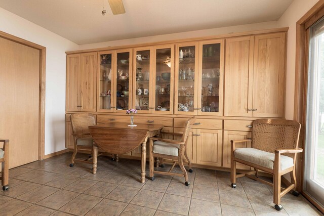 17159 Stalker Lake Rd, Battle Lake, MN 56515 - dining room featuring light tile patterned floors, healthy amount of natural light, and ceiling fan