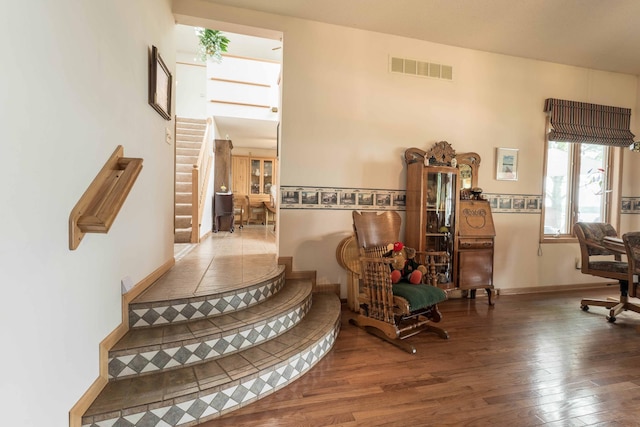 17159 Stalker Lake Rd, Battle Lake, MN 56515 - living area featuring hardwood / wood-style flooring, stairway, and baseboards