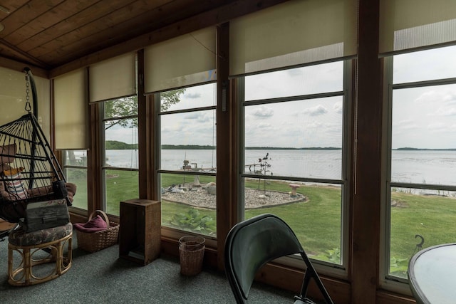 17159 Stalker Lake Rd, Battle Lake, MN 56515 - sunroom featuring a water view, wooden ceiling, carpet flooring, and lofted ceiling