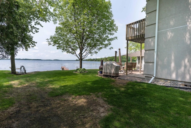 17159 Stalker Lake Rd, Battle Lake, MN 56515 - view of green lawn featuring a water view