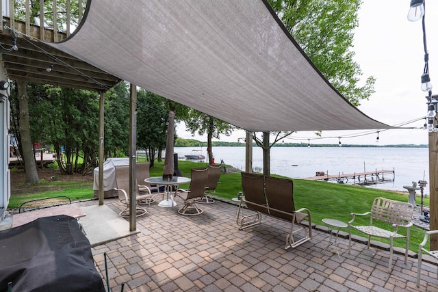 17159 Stalker Lake Rd, Battle Lake, MN 56515 - view of patio featuring a water view
