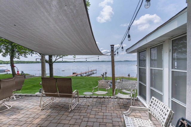 17159 Stalker Lake Rd, Battle Lake, MN 56515 - view of patio with a water view