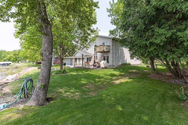 17159 Stalker Lake Rd, Battle Lake, MN 56515 - view of grassy yard with a balcony