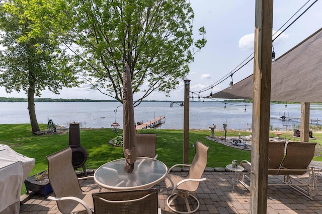 17159 Stalker Lake Rd, Battle Lake, MN 56515 - view of patio / terrace with a water view and outdoor dining area