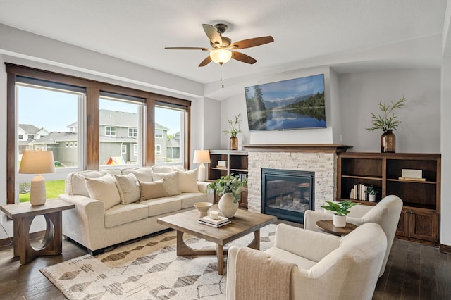 1840 Old Mill Ct, Centerville, MN 55038 - living room featuring a ceiling fan, wood-type flooring, and a stone fireplace