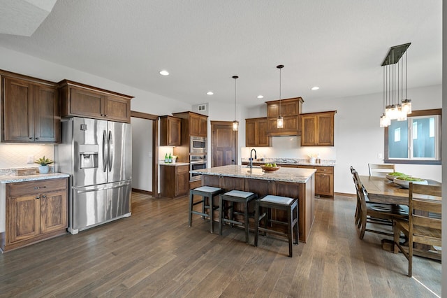 1840 Old Mill Ct, Centerville, MN 55038 - kitchen featuring appliances with stainless steel finishes, dark wood-style flooring, backsplash, a sink, and recessed lighting