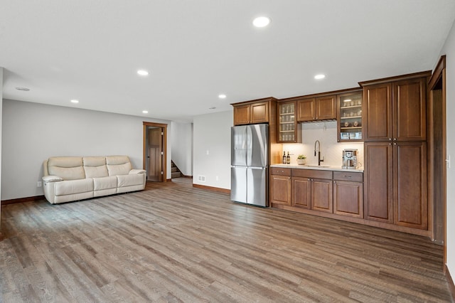 1840 Old Mill Ct, Centerville, MN 55038 - kitchen featuring freestanding refrigerator, a sink, wood finished floors, baseboards, and recessed lighting