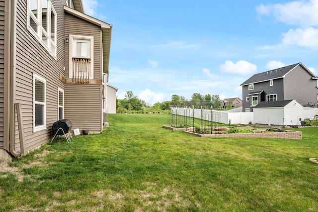 1840 Old Mill Ct, Centerville, MN 55038 - view of grassy yard featuring a vegetable garden