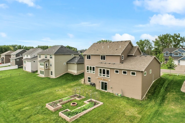 1840 Old Mill Ct, Centerville, MN 55038 - rear view of house featuring a residential view and a vegetable garden