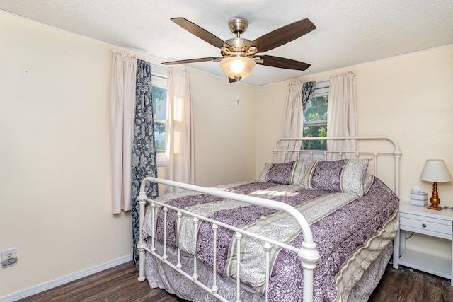 6269 85th St NW, Corinna Twp, MN 55358 - bedroom with wood finished floors, multiple windows, baseboards, and ceiling fan