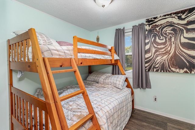 6269 85th St NW, Corinna Twp, MN 55358 - bedroom with wood finished floors, a textured ceiling, and baseboards