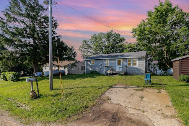 6269 85th St NW, Corinna Twp, MN 55358 - view of front of home with a lawn
