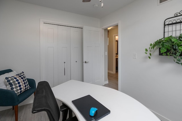3900 Orchardview Ln NW, Rochester, MN 55901 - office with wood finished floors, baseboards, and ceiling fan
