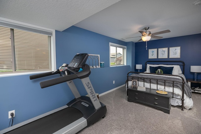 3900 Orchardview Ln NW, Rochester, MN 55901 - bedroom with ceiling fan, carpet flooring, baseboards, and a textured ceiling
