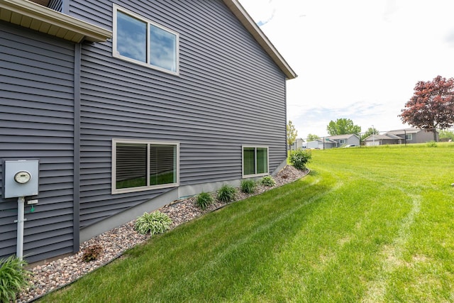 3900 Orchardview Ln NW, Rochester, MN 55901 - view of side of home with a lawn